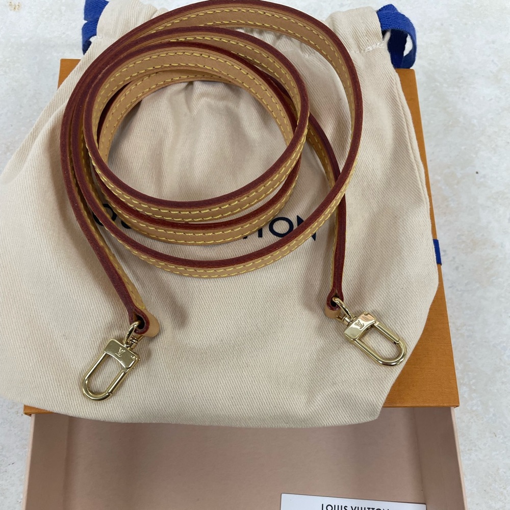 Authentic Louis Vuitton cross body strap . Very good condition.